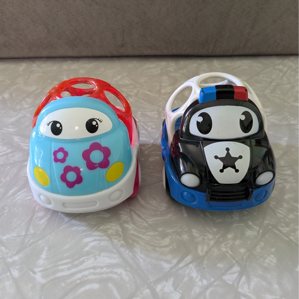 Bright Starts Oball Go Grippers Toy Car Set Floral and Police Cruiser 2 Pack
